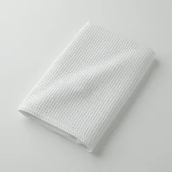 Badhanddoek in bijenraattricot 320 g/m2