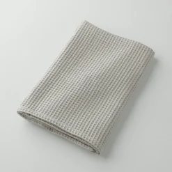 Badhanddoek in bijenraattricot 320 g/m2
