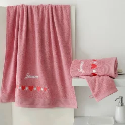Badstof met geborduurde hartjes, personaliseerbaar