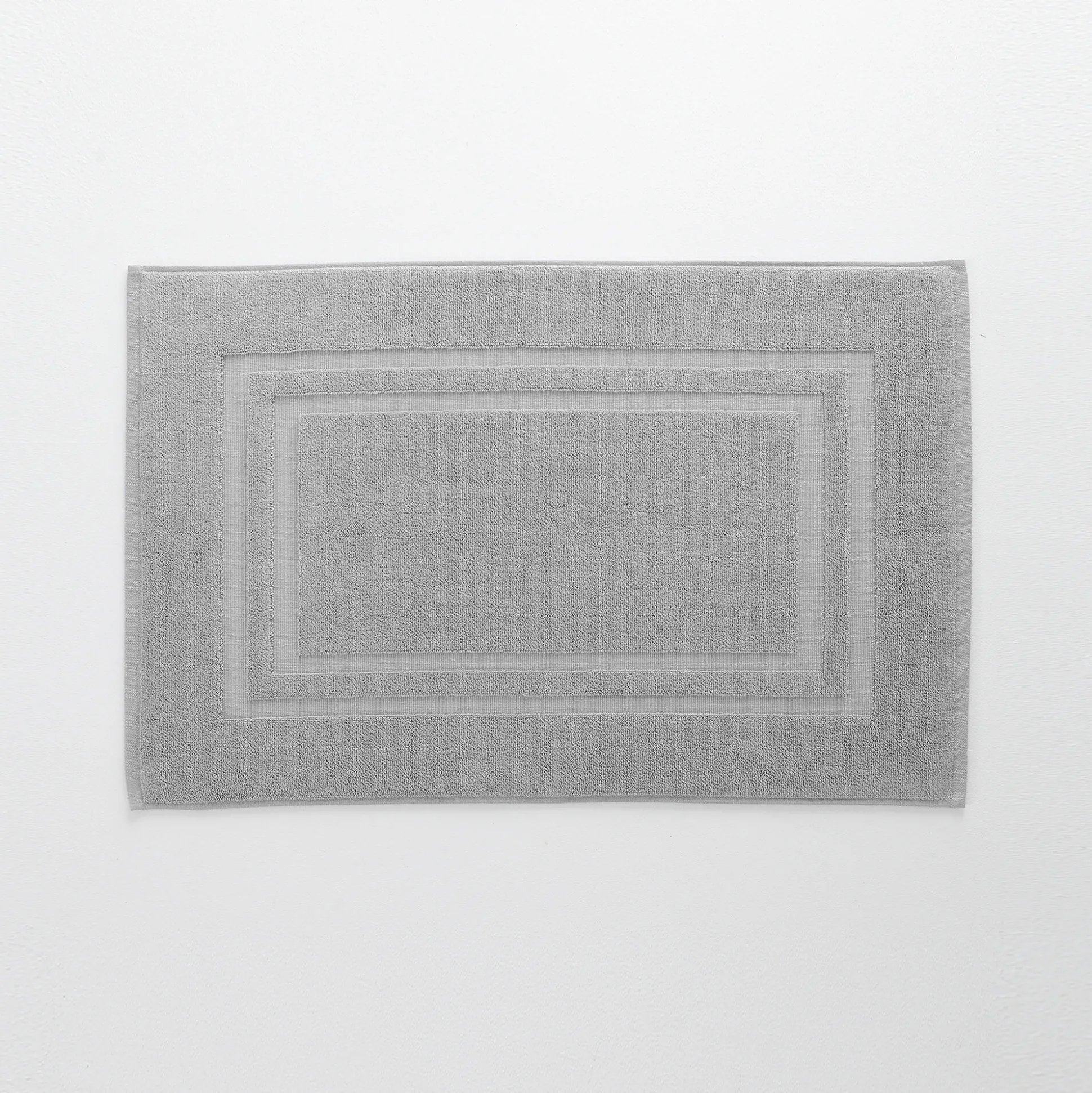 Badtapijtje in badstof met dubbele sierrand