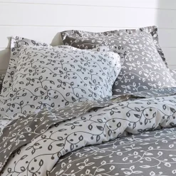 Bedlinnen Héritage in flanel met krulmotieven<br>