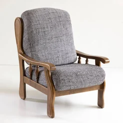 Bi-rekbare hoes in microvezel, met effen faux-uni effect, voor rustieke fauteuil