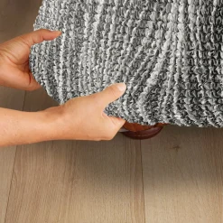 Bi-rekbare hoes in microvezel met golvenmotief, voor fauteuil en zitbank