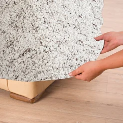 Bi-rekbare hoes in microvezel, effen faux-uni effect voor fauteuil en zitbank