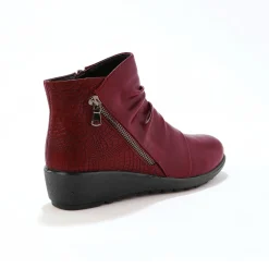 Boots met sleehak en rits, getextureerd effect achter