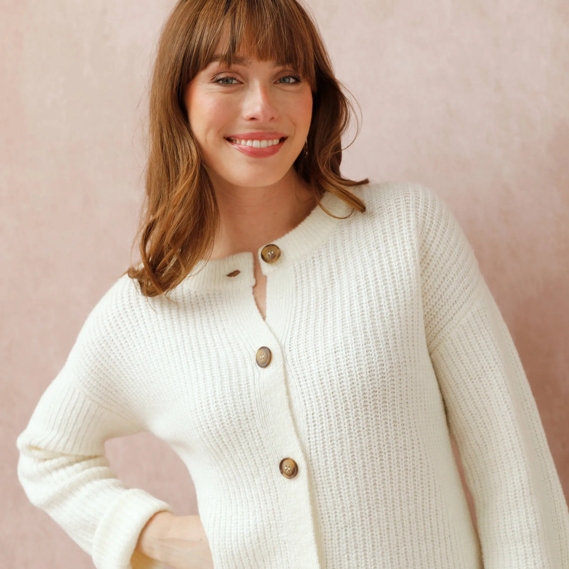Cardigan in patenttricot met knoopsluiting en lange mouwen