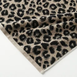 Collectie handdoeken in jacquard met luipaardhuidmotief 450 g/m2