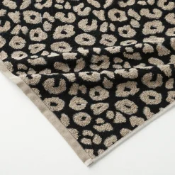 Collectie handdoeken in jacquard met luipaardhuidmotief 450 g/m2