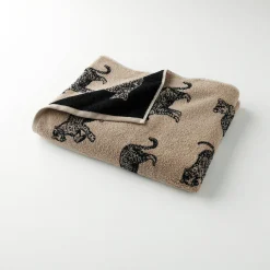 Collectie handdoeken in jacquard met luipaardmotief 450 g/m2
