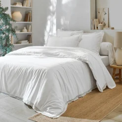 Effen bedlinnen in kant en katoen