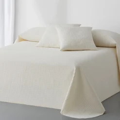 Effen bedsprei met gewafeld effect