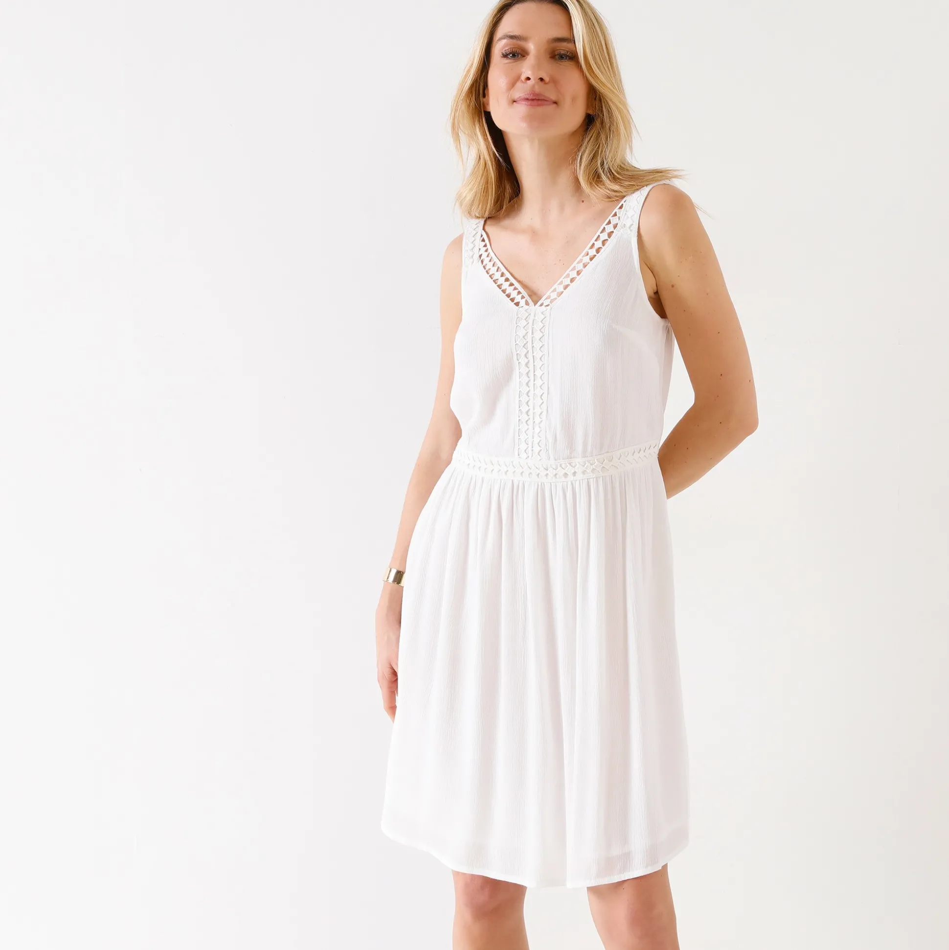 Effen jurk in crepon en macramé