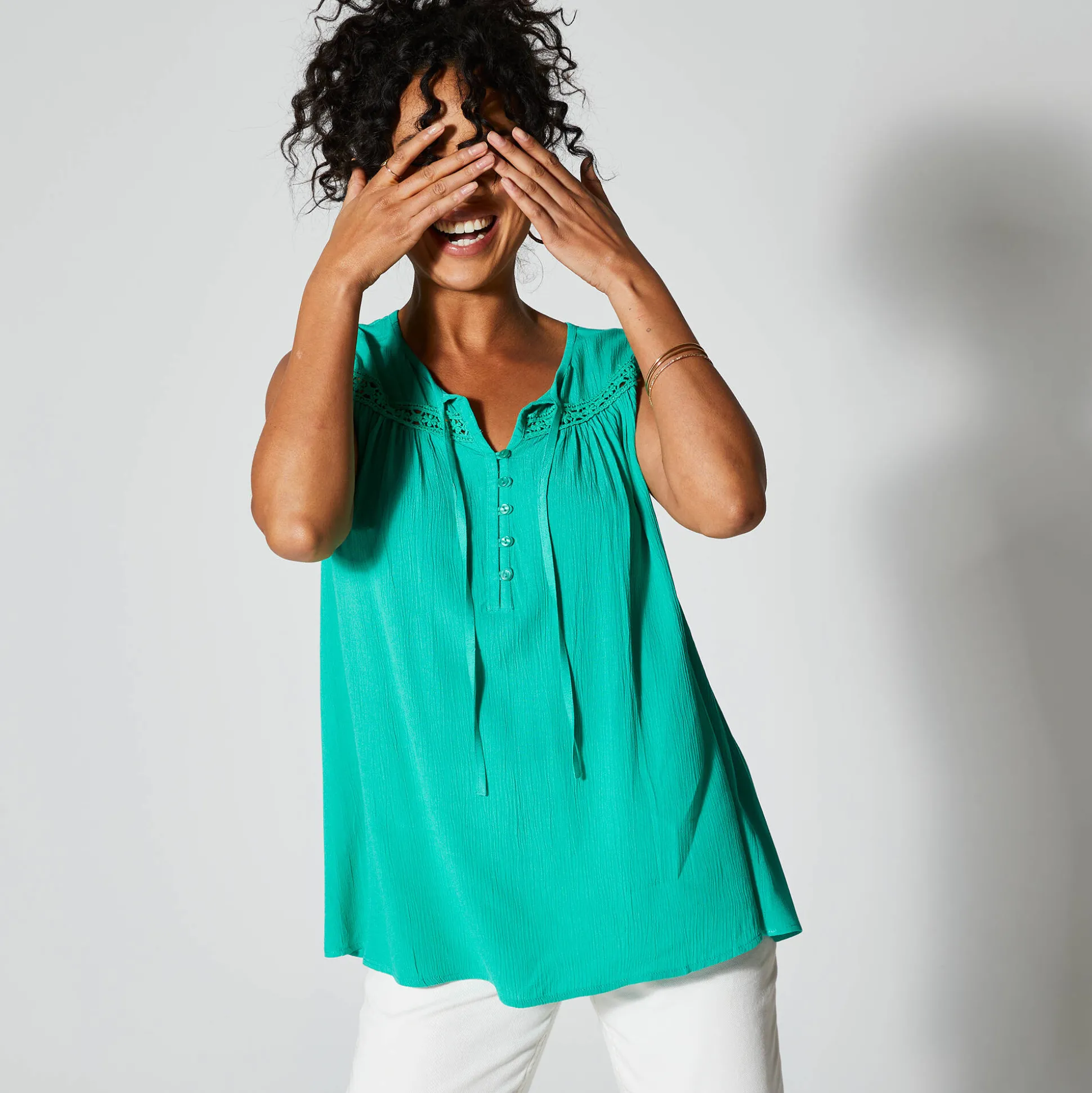 Effen, mouwloze tuniek, crepon en macramé