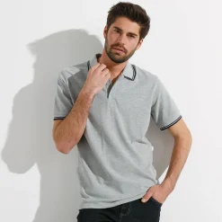 Effen polo in piquétricot met korte mouwen