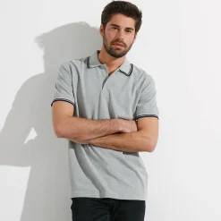 Effen polo in piquétricot met korte mouwen