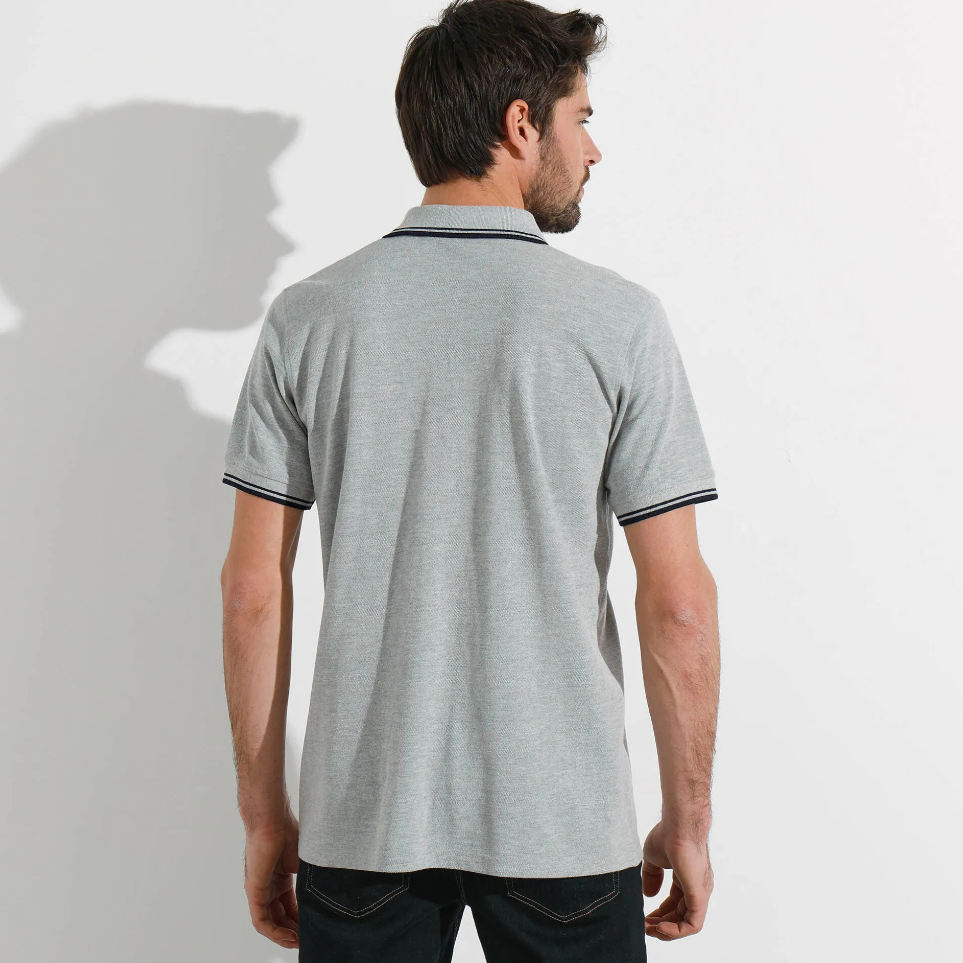Effen polo in piquétricot met korte mouwen