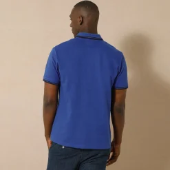 Effen polo in piquétricot met korte mouwen