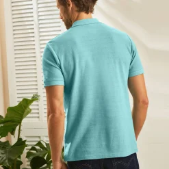 Effen polo in piquétricot met korte mouwen