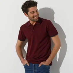 Effen polo in piquétricot met korte mouwen