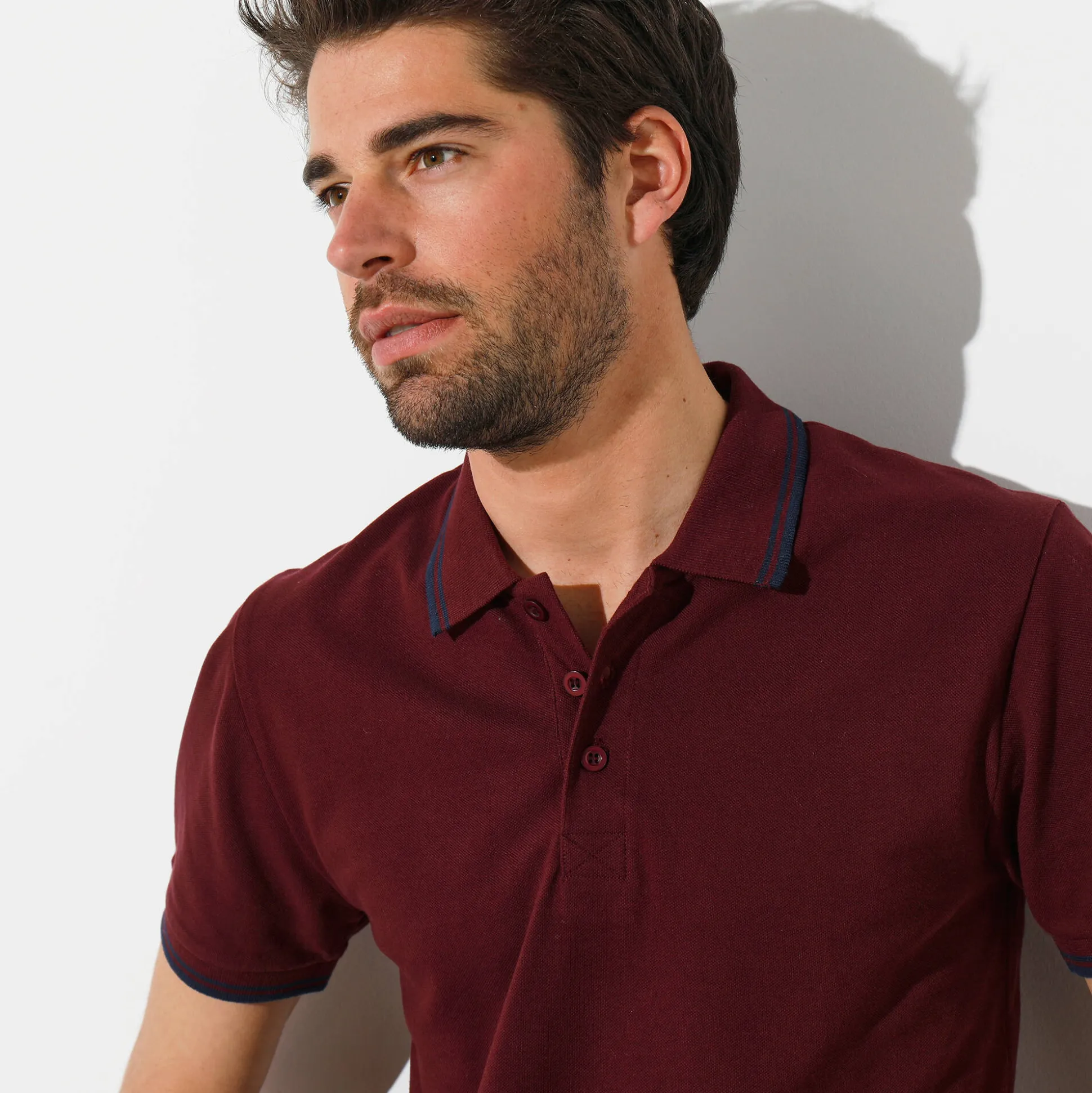 Effen polo in piquétricot met korte mouwen