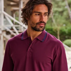 Effen polo in piquétricot met lange mouwen