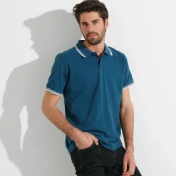 Effen polo in piquétricot met korte mouwen