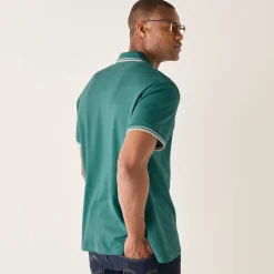 Effen polo in piquétricot met korte mouwen