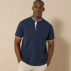 Effen polo in piquétricot, met maokraagje en korte mouwen