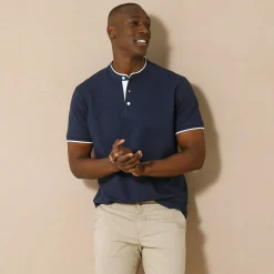 Effen polo in piquétricot, met maokraagje en korte mouwen