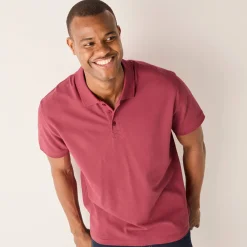Effen polo in piquétricot met korte mouwen