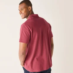 Effen polo in piquétricot met korte mouwen
