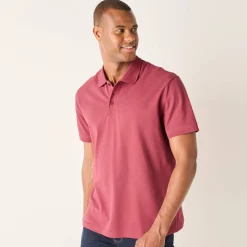 Effen polo in piquétricot met korte mouwen
