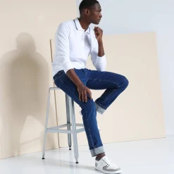 Effen polo in piquétricot met lange mouwen
