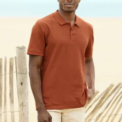 Effen polo in piquétricot met korte mouwen