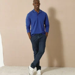 Effen polo in piquétricot met lange mouwen