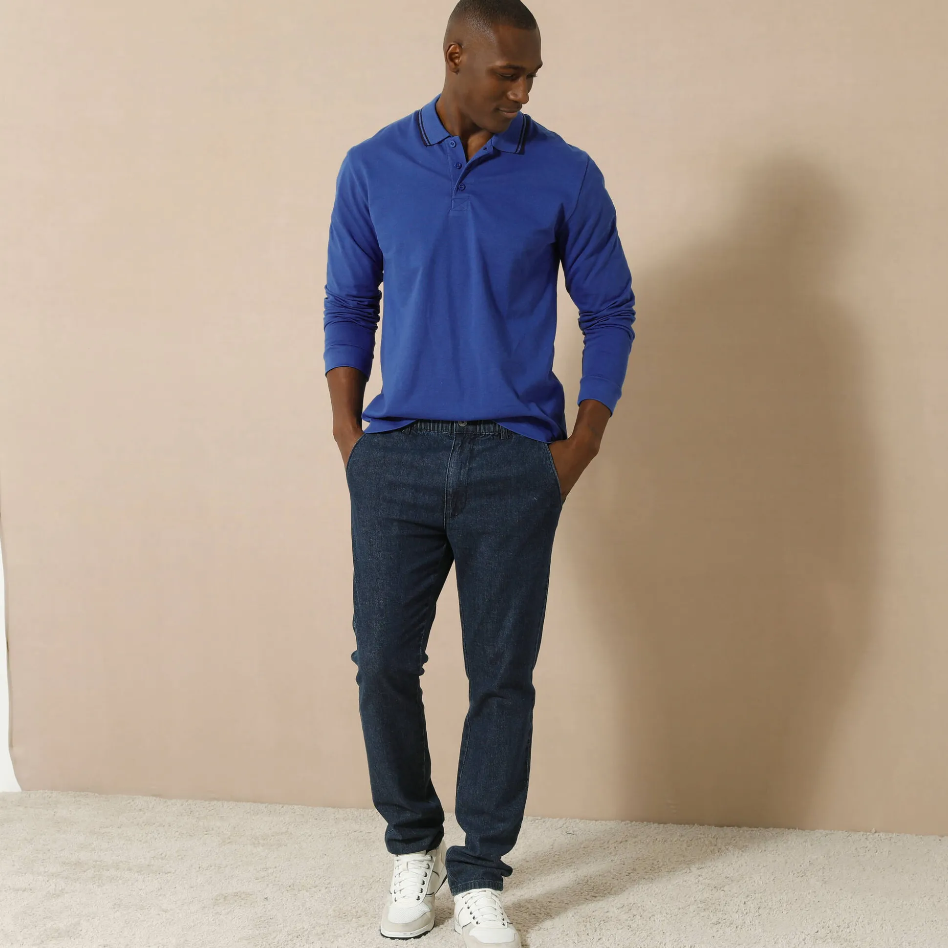 Effen polo in piquétricot met lange mouwen