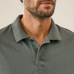 Effen polo in piquétricot met korte mouwen