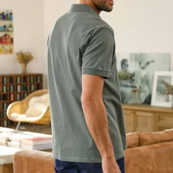 Effen polo in piquétricot met korte mouwen