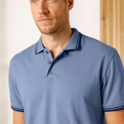 Effen polo in piquétricot met korte mouwen