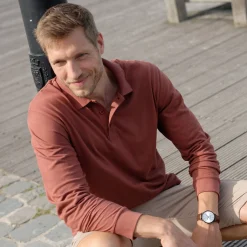 Effen polo in piquétricot met lange mouwen