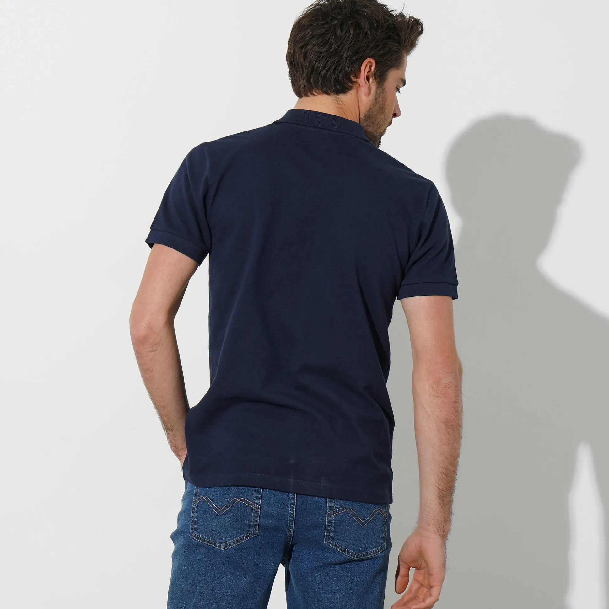 Effen polo in piquétricot met korte mouwen