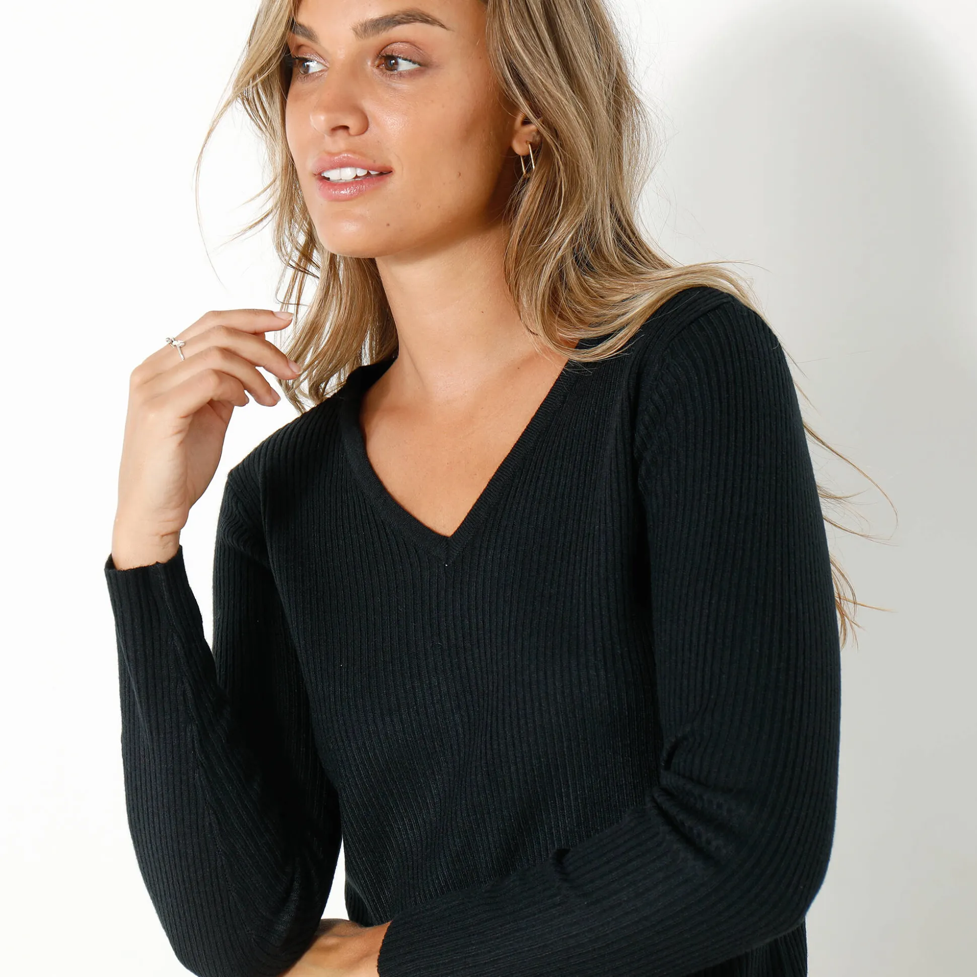 Effen trui in ribbeltricot met V-hals