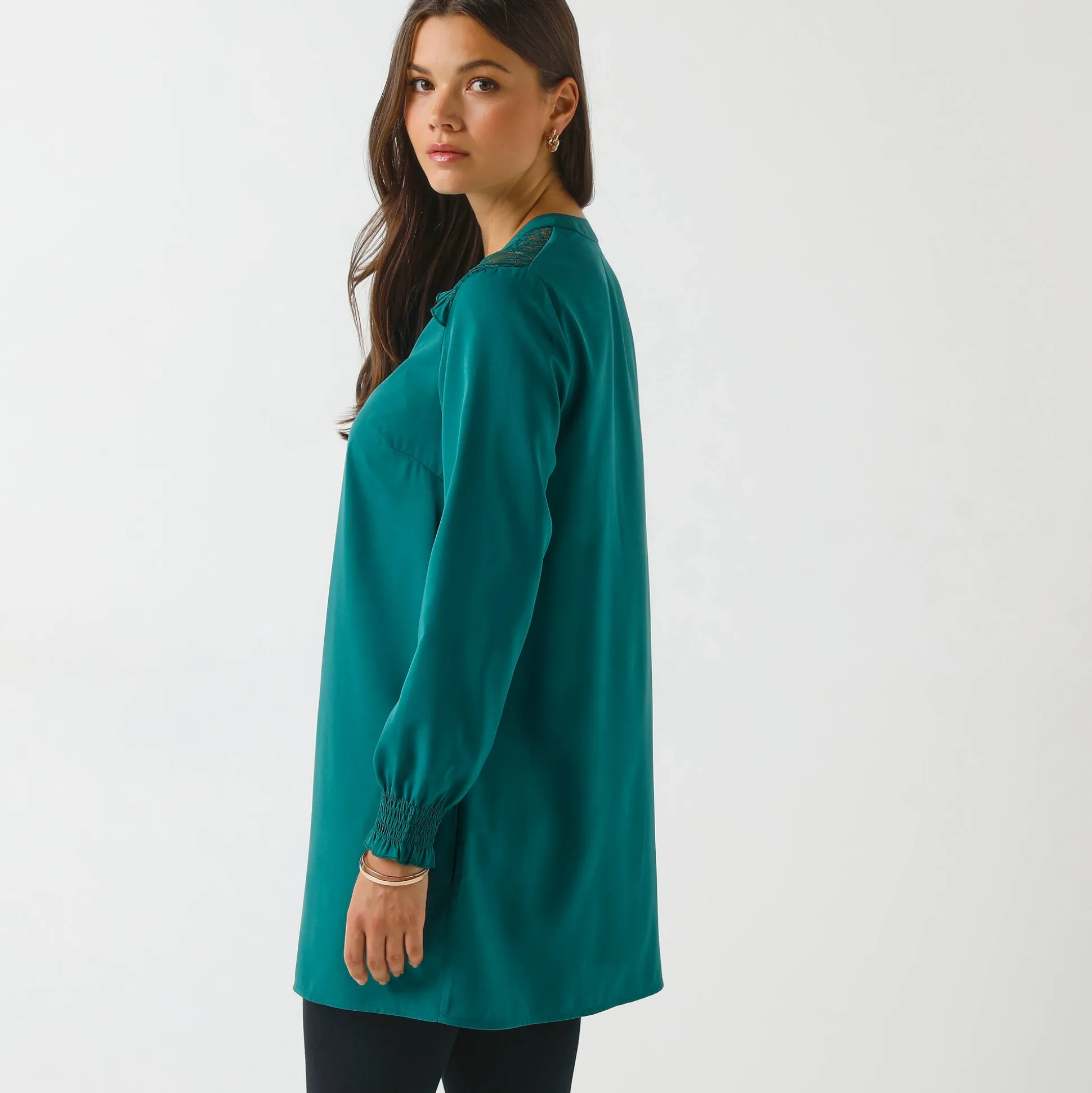 Effen tuniek met kant en lange mouwen