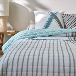 Gematelasseerde bedsprei met grafische print