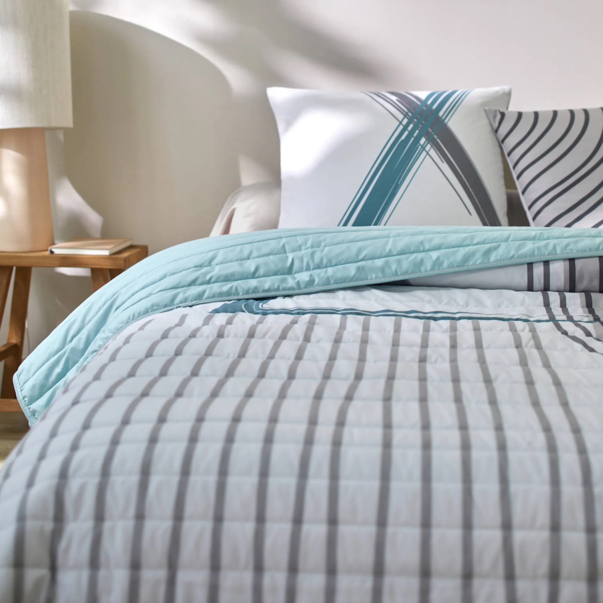 Gematelasseerde bedsprei met grafische print