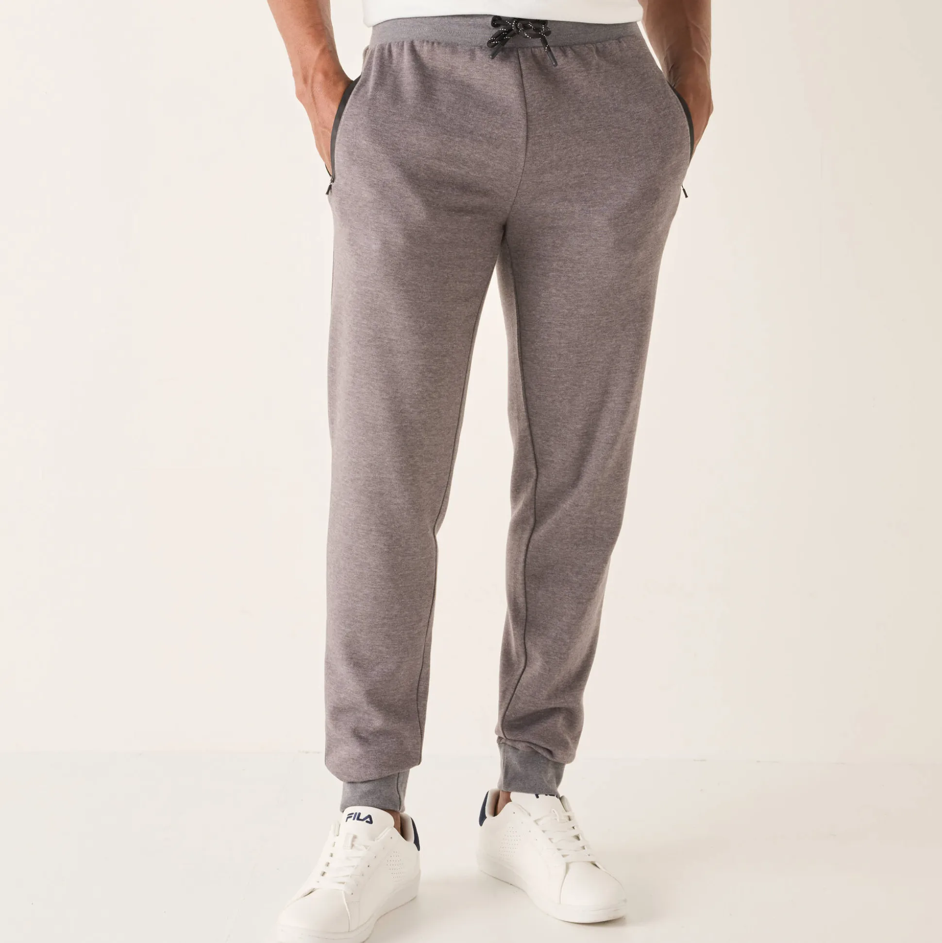 Joggingbroek met aangetrokken pijponderkanten, contrasterende details