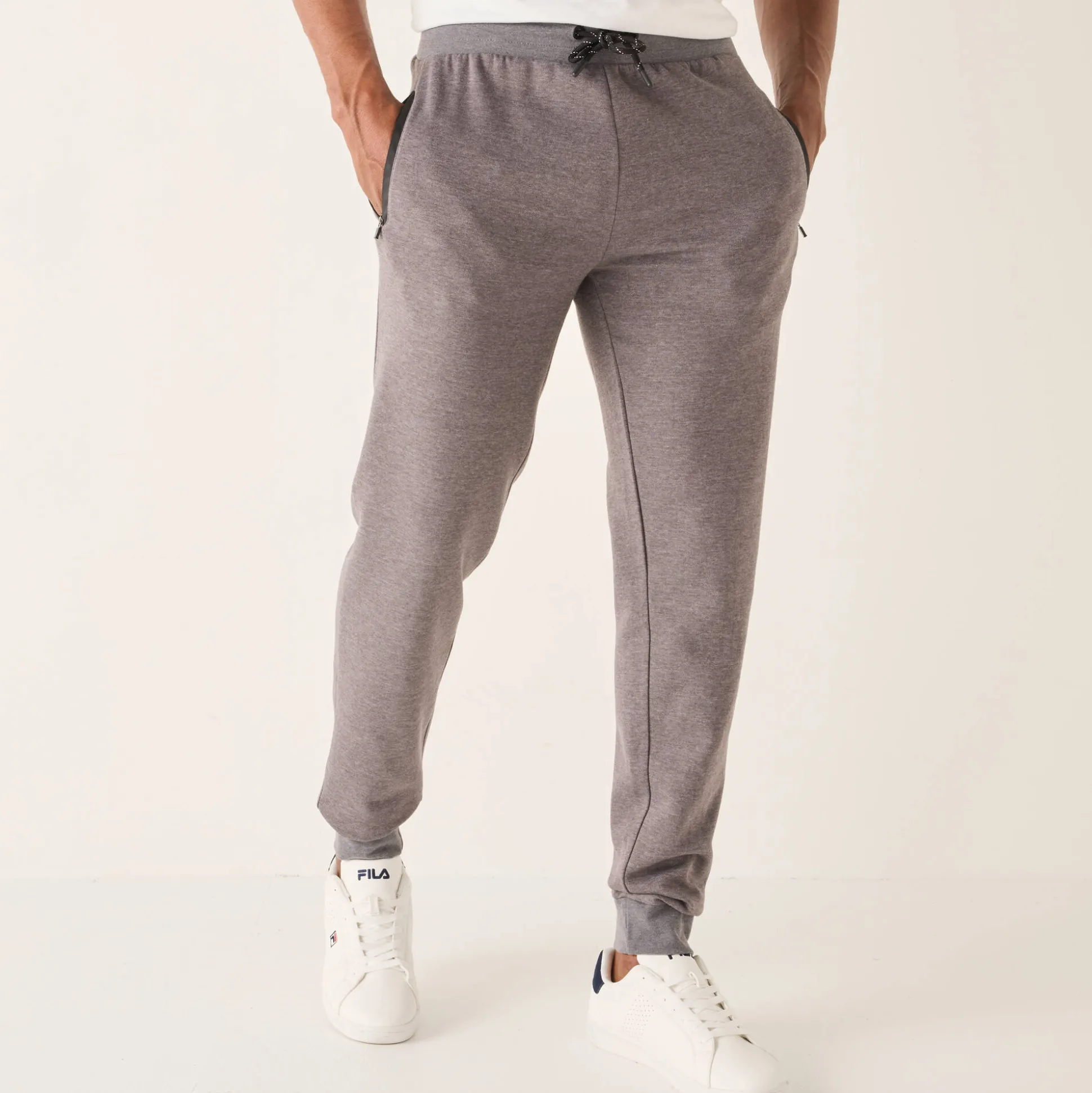 Joggingbroek met aangetrokken pijponderkanten, contrasterende details