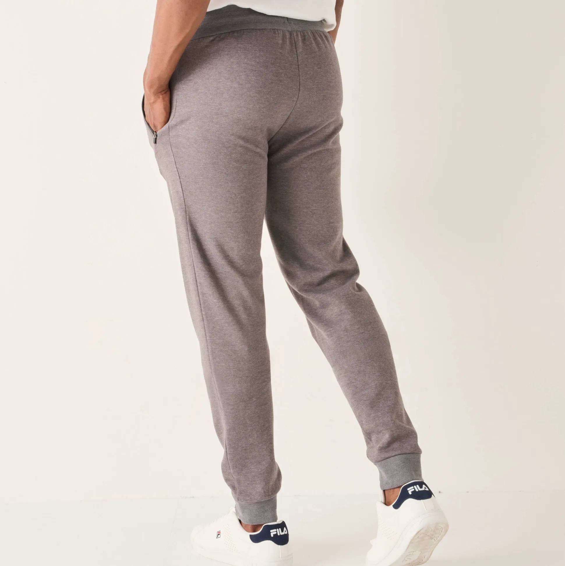 Joggingbroek met aangetrokken pijponderkanten, contrasterende details