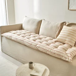 Lang, decoratief kussen in artisanaal weefsel
