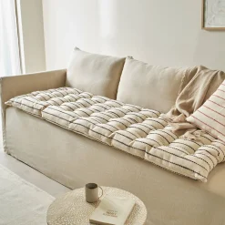 Lang, decoratief kussen in artisanaal weefsel